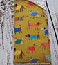 Dogs on mustard padded glasses case