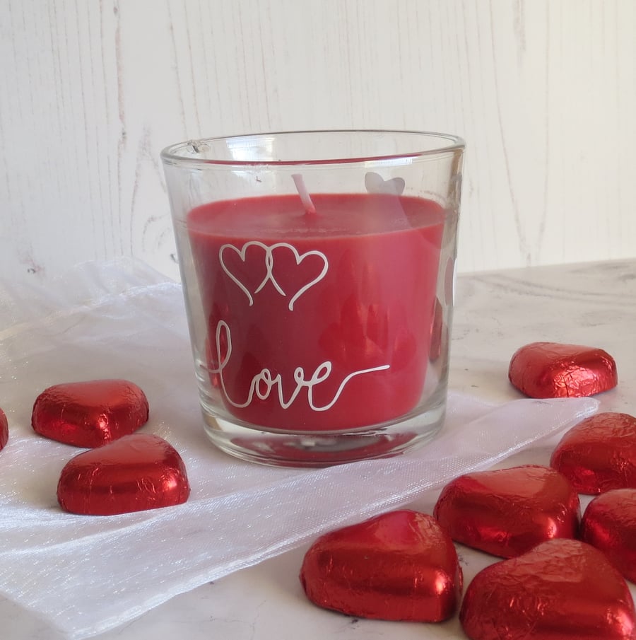 Anniversary themed glass candle jar with candle