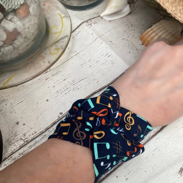 Wide cuff fabric bracelet in music theme
