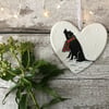 Black Labrador in the snow - Hand painted ceramic heart