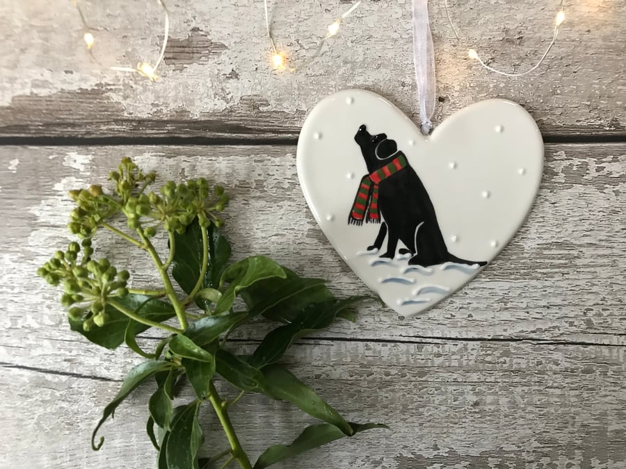 Black Labrador in the snow - Hand painted ceramic heart