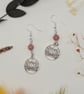 Sterling silver lotus flower dangle earrings with rhodonite beads