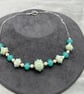pale green and ivory cream lampwork glass beaded necklace