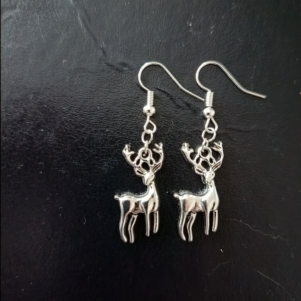 Silver stag charm dangle earrings 