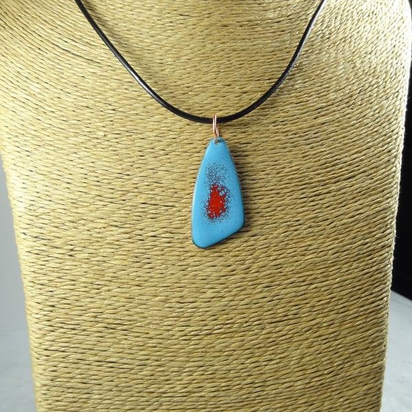 Blue and red glass enamelled copper pendant on a leather cord, 38x18mm (0076)