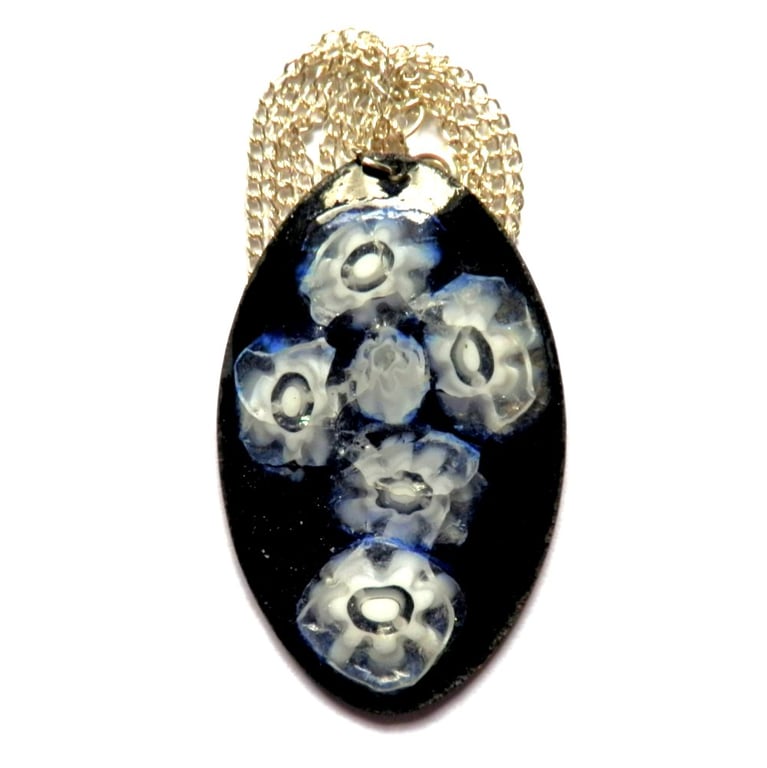 oval pendant - white millefiore beads over dark blue enamel