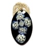oval pendant - white millefiore beads over dark blue enamel