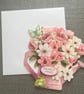 Pink floral watering can birthday card 