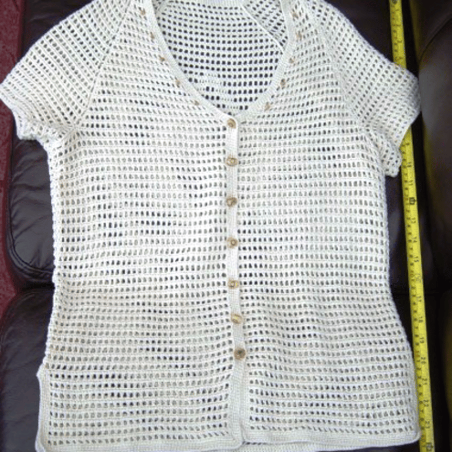 Ladies Hand Crocheted Short Sleeve Jacket, with wooden bead detail and buttons.