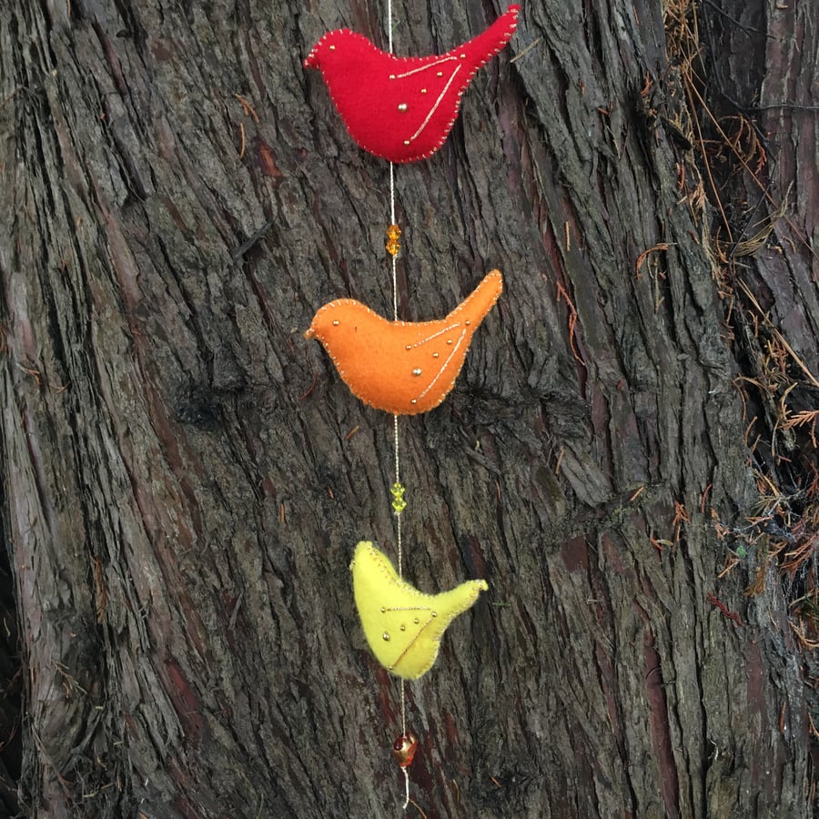 Felt bird hanging decoration in red,orange and yellow