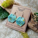 Turquoise and teal abstract hexagon ceramic earrings on surgical steel hooks