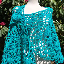 Crescent shaped handmade shawl in vibrant jade green 