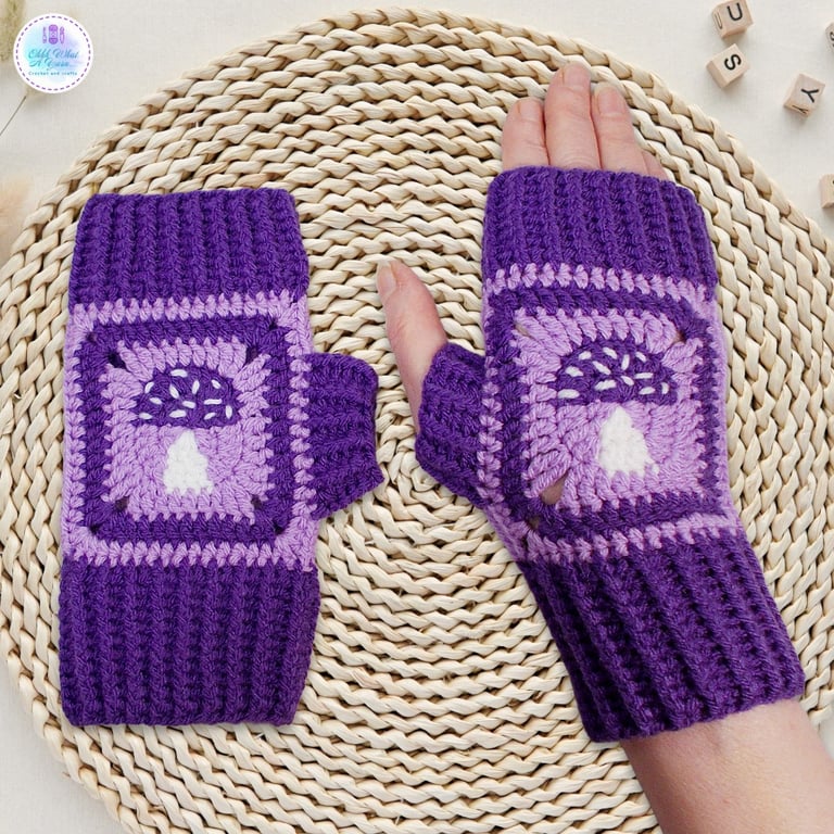 Crochet gloves in a purple lilac and white toadstool design. Toadstool gloves.