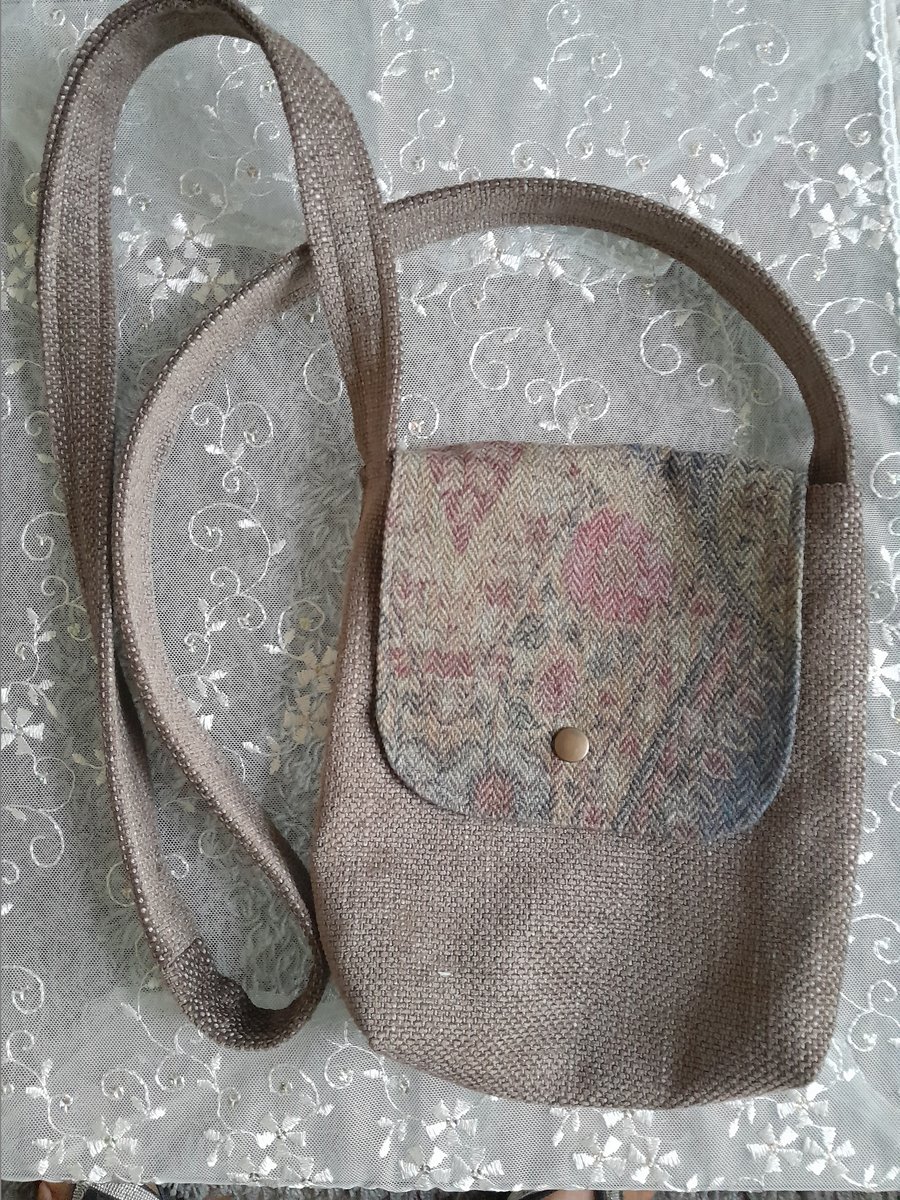Cross body bag, soft brown canvas with an italian wool mix flap, long staps.