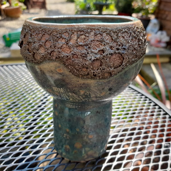 Handmade stoneware pot with green & textured lava look glaze