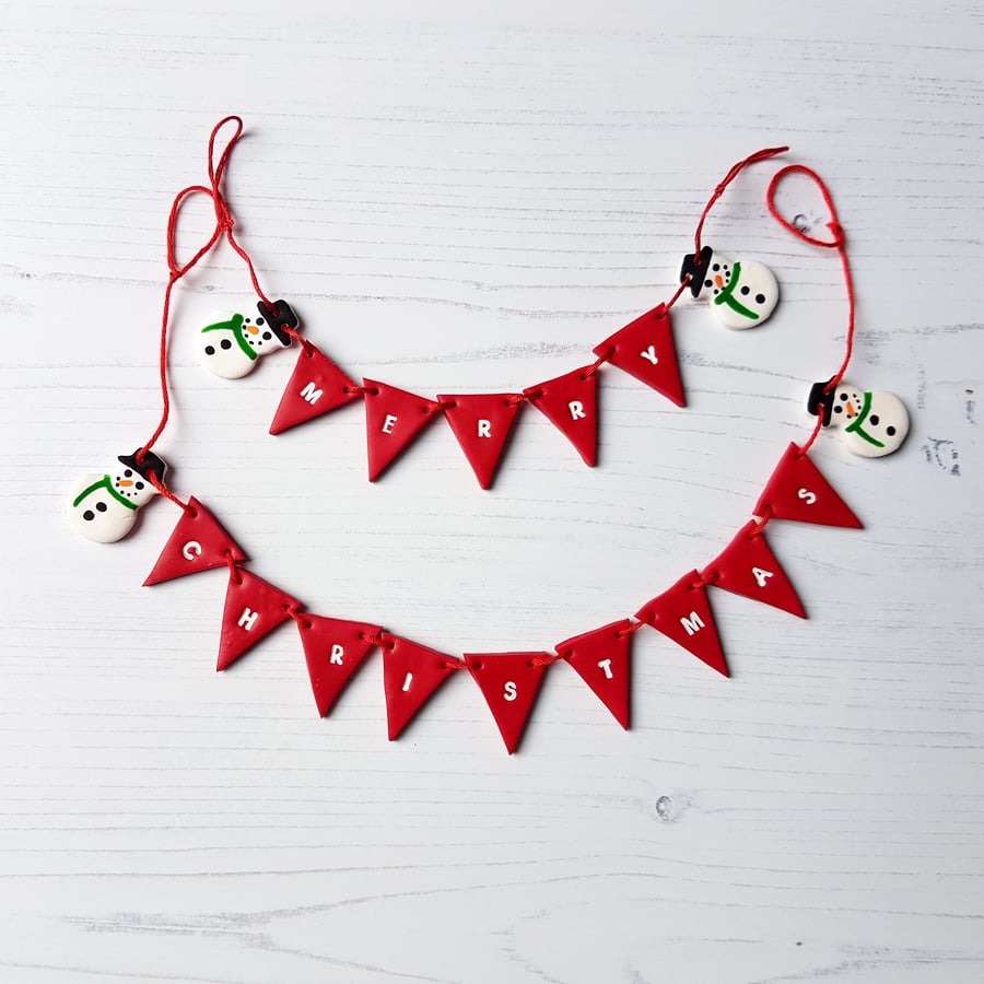 Christmas snowman themed clay bunting decoration, hand stamped, hand painted