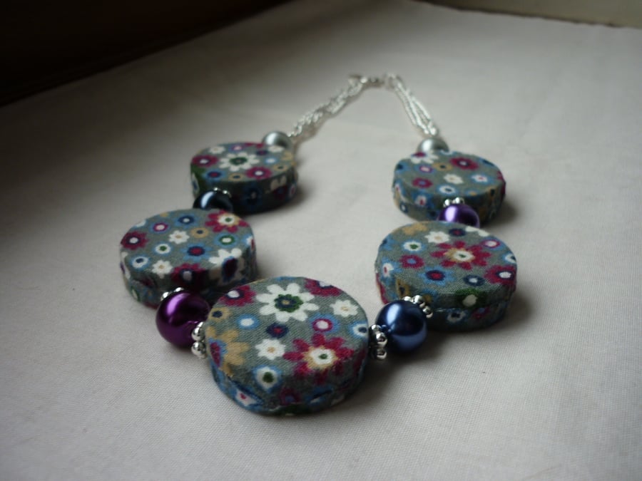 FLORAL GREY FABRIC COVERED BEADS AND SILVER NECKLACE.  1004