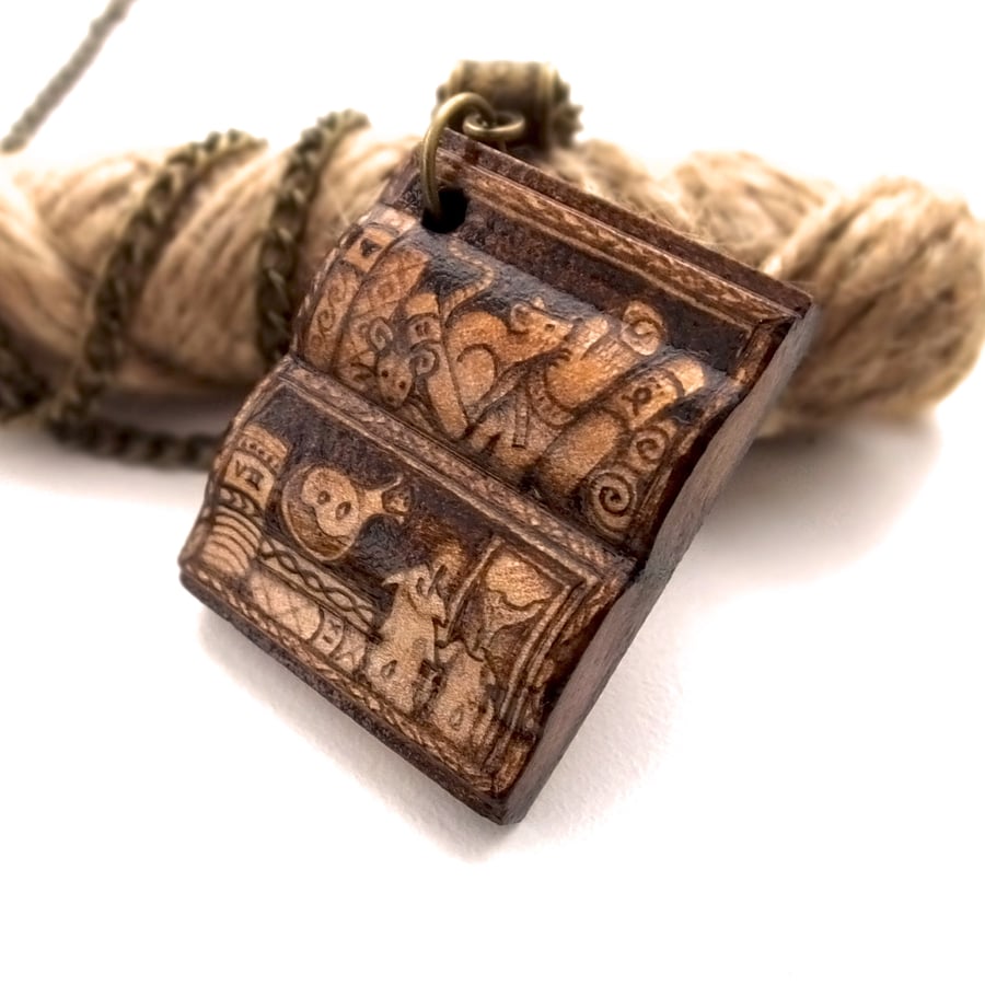 A book shaped bookshelf for a wizard or witch, with spellbooks, potions and mice