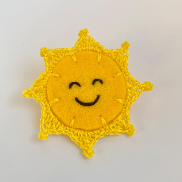 Sun brooch smiling embroidery with micro crochet sun rays