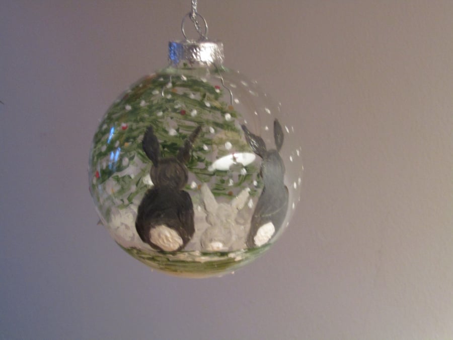 Glass Christmas bauble, large 'rabbits at Christmas' hand painted bauble