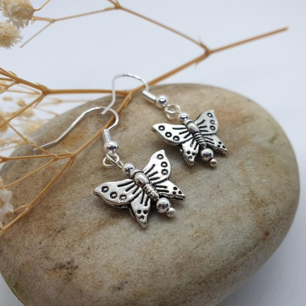 silver plated earrings with silver butterfly charms