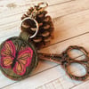 Up-cycled embroidered butterfly key ring or bag charm. 