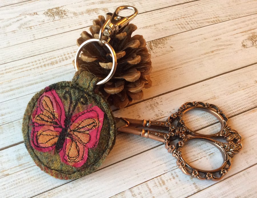Up-cycled embroidered butterfly key ring or bag charm. 