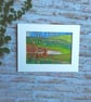 Textile unframed picture with hare in landscape 