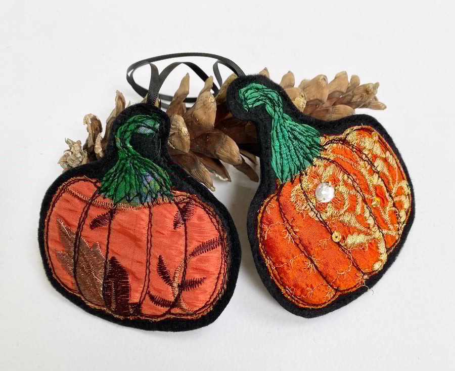 Embroidered up-cycled pumpkin home decoration.