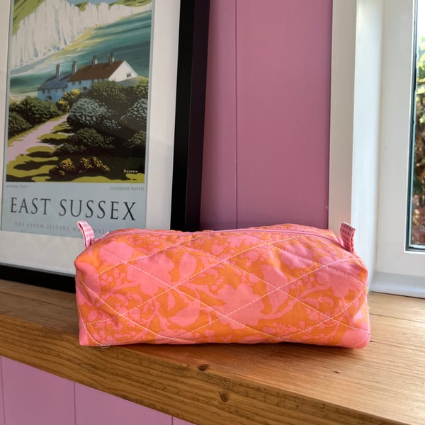 Quilted orange and pink floral make up bag 