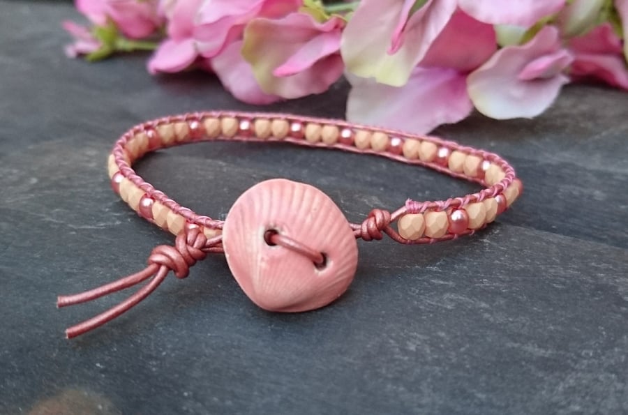 Rose gold leather bracelet with peach beads and shell ceramic button