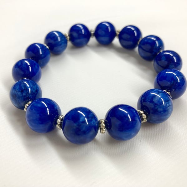 Stretch Bracelet with SODALITE and Antique Silver Indonesian Flower Beads