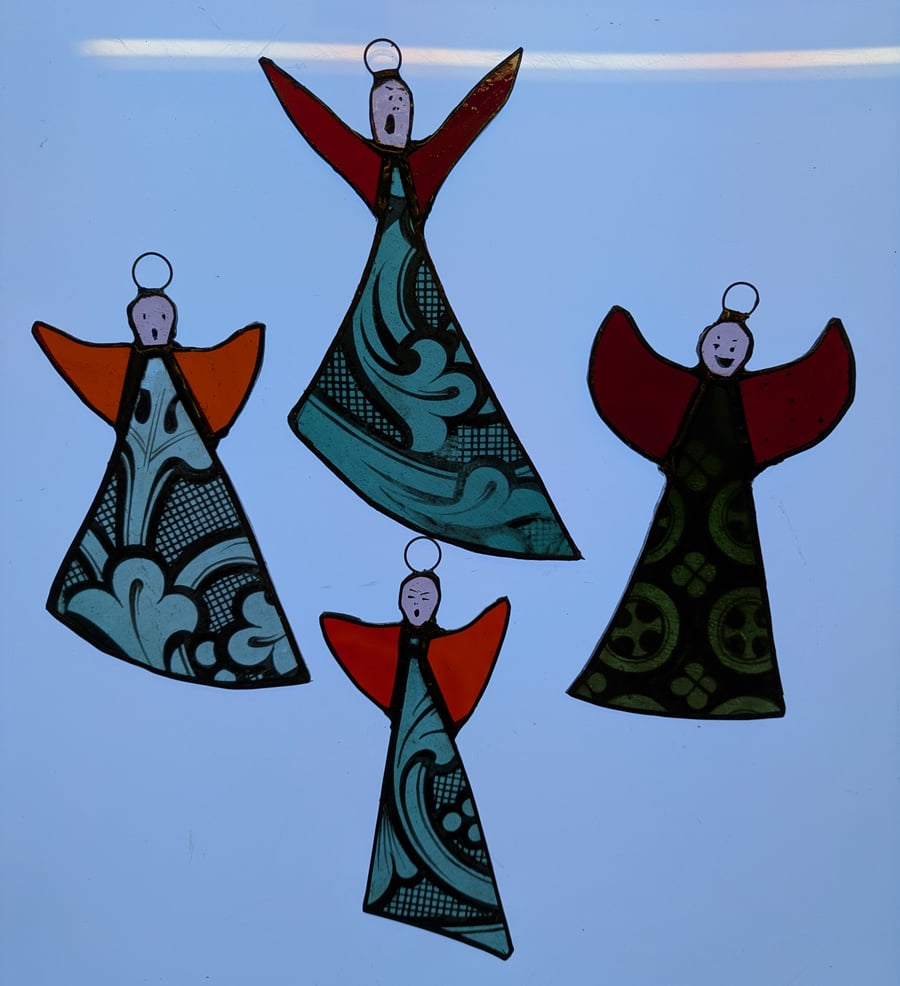 Crazy stained glass Christmas angels wit painte bodies and faces and plain wings