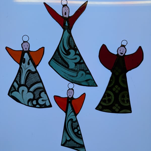 Crazy stained glass Christmas angels wit painte bodies and faces and plain wings