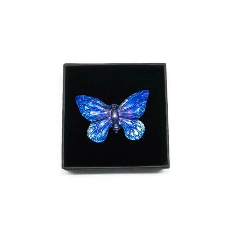 Butterfly brooch iridescent purple and blue hand painted resin.