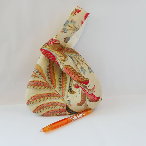 Elegant Japanese Knot bag in printed linen 