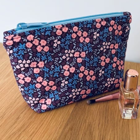 Small cotton makeup bag, pouch, purse, in purple, pink & blue floral design.