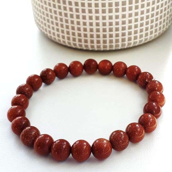 Gemstone bead bracelet goldstone on strong elastic 8 mm round beads unisex
