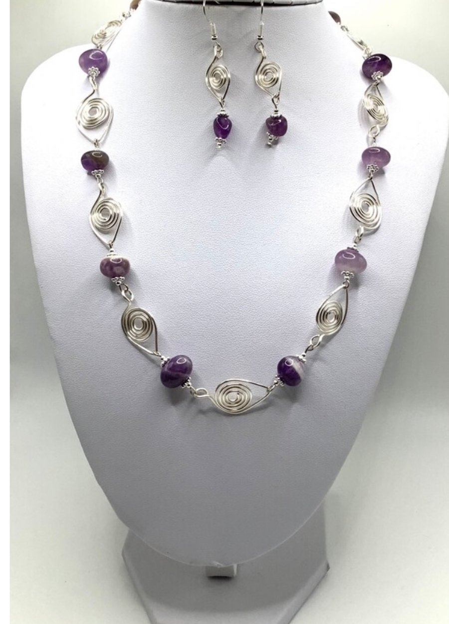 Amethyst and silver plated wire work necklace and earring set 