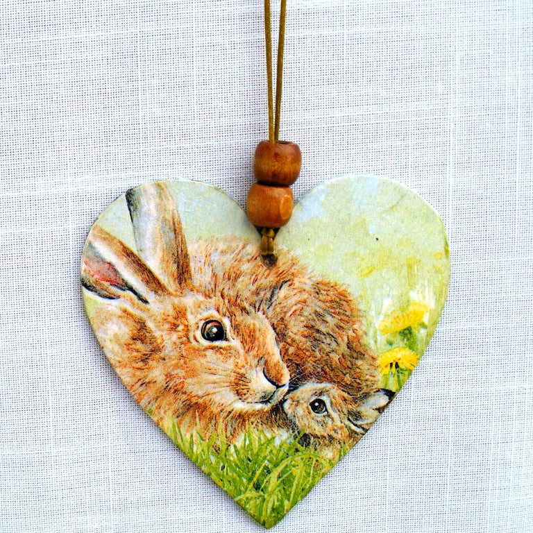 Mum and young rabbit decoupaged wooden heart wall decoration.