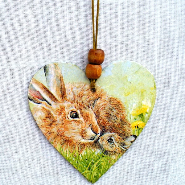 Mum and young rabbit decoupaged wooden heart wall decoration.
