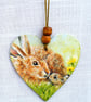 Mum and young rabbit decoupaged wooden heart wall decoration. - Image 1