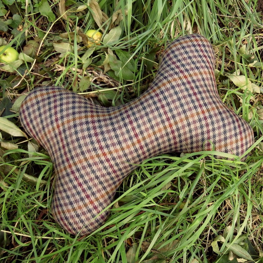 Dog cushion.  A bone shaped cushion made from a fine tweed wool.  Dog pillow.