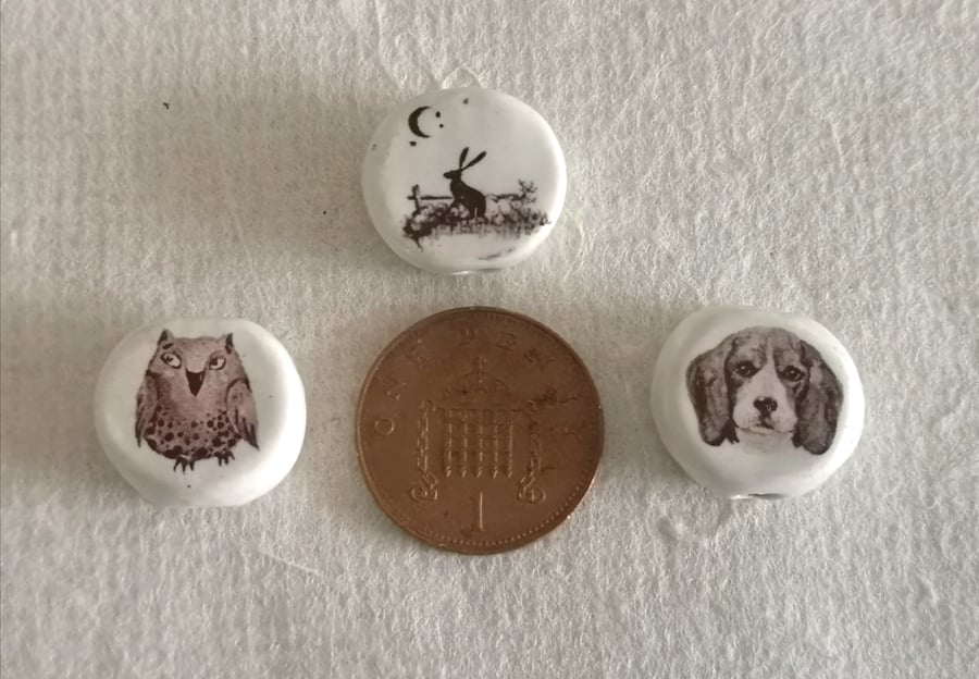 Ceramic beads with owl, hare and dog pictures