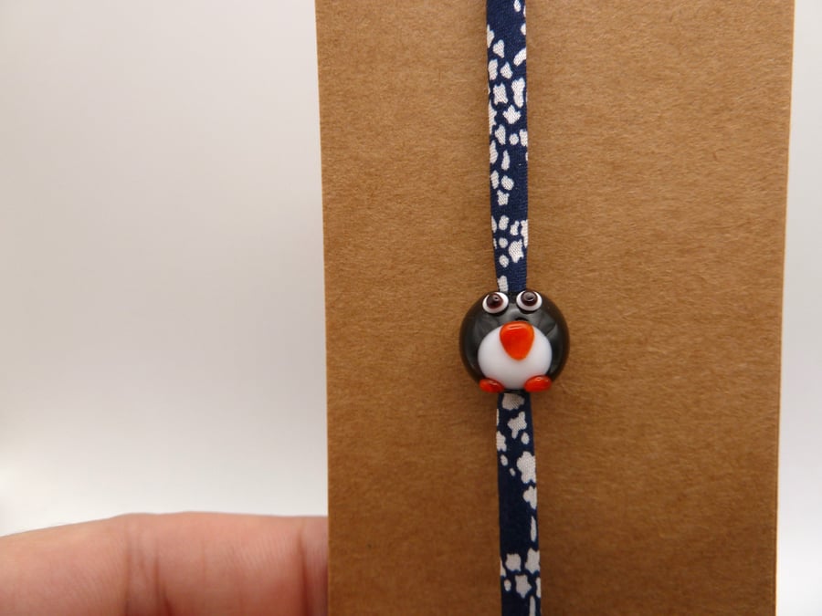 lampwork glass penguin jewellery, adjustable fabric bracelet