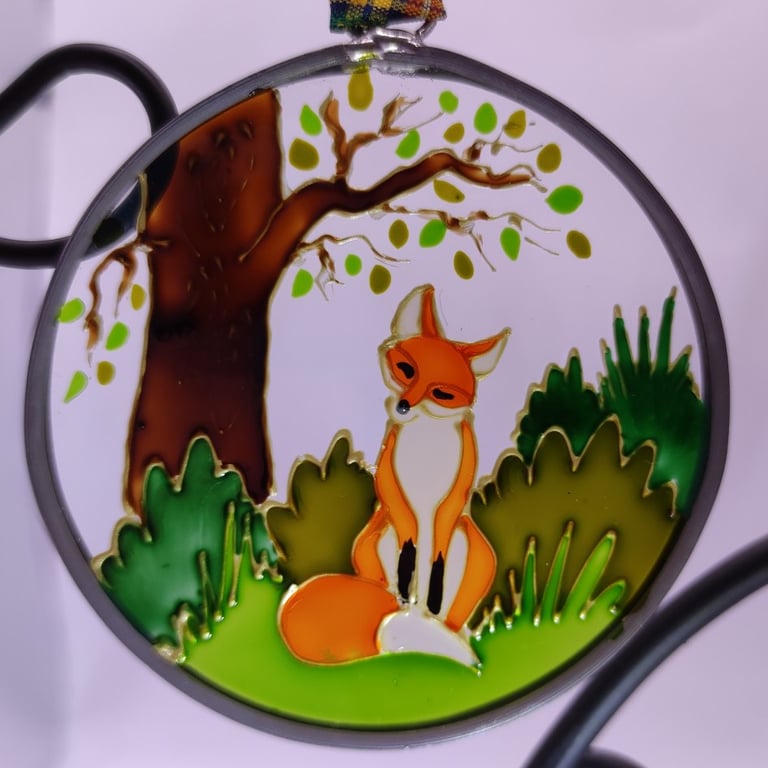 Handmade glass painted window hanging or Christmas tree bauble