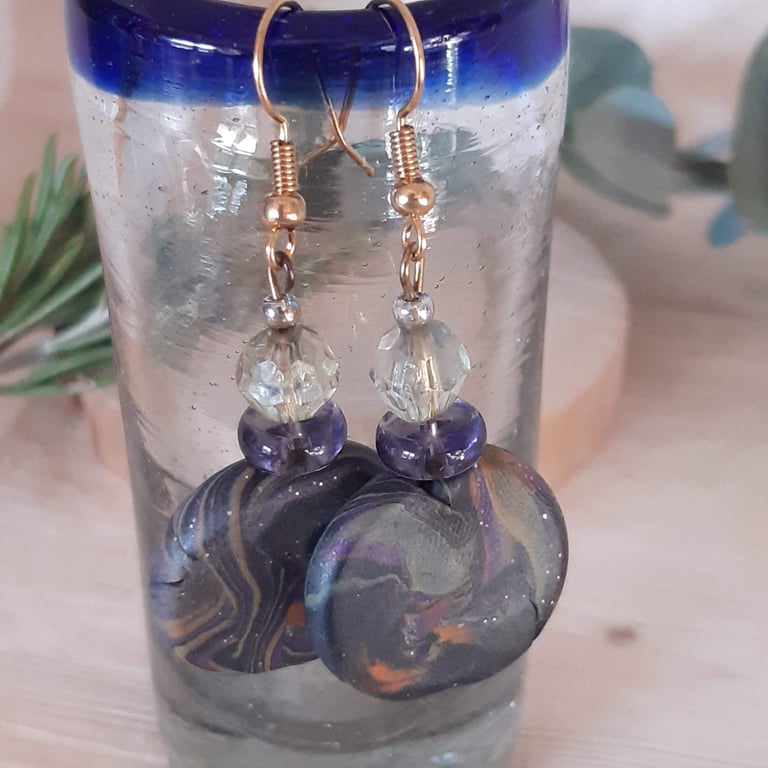 Polymer clay disc shaped dangly earrings