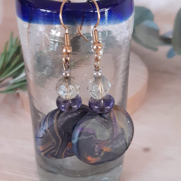 Polymer clay disc shaped dangly earrings