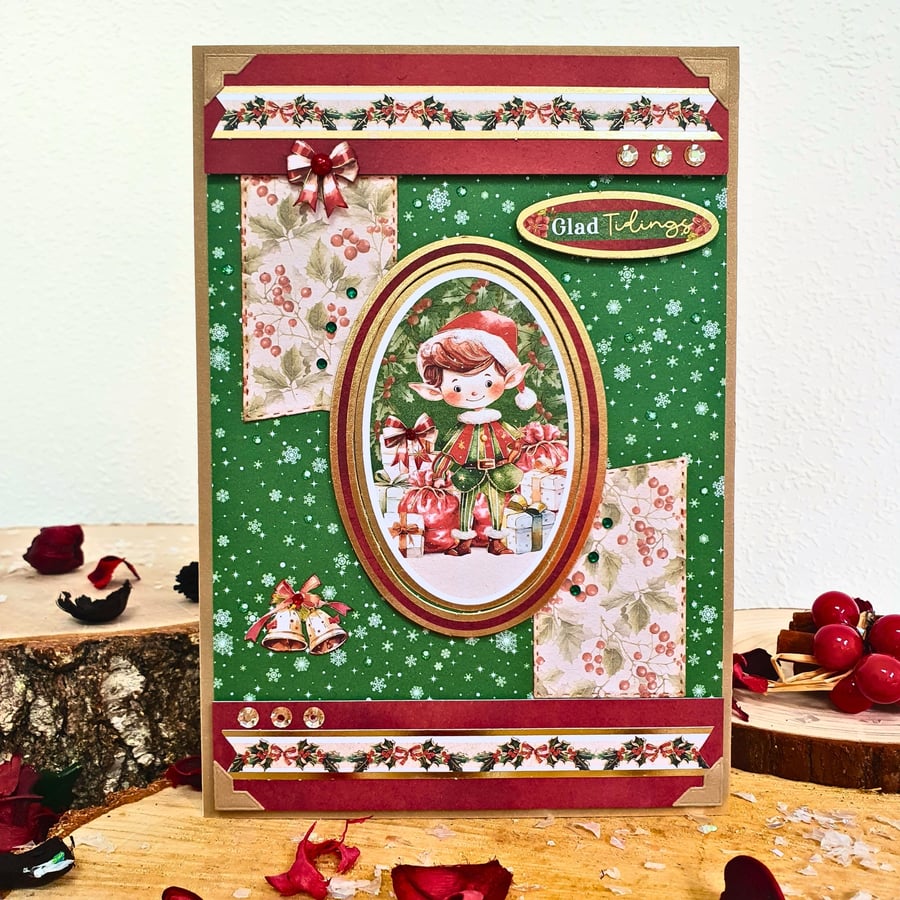 Christmas Card With An Elf Surrounded By Christmas Presents, Glad Tidings