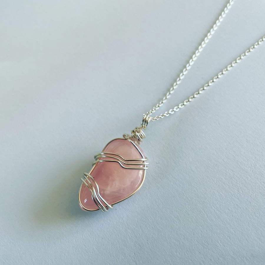 Wire wrapped rose quartz pendant